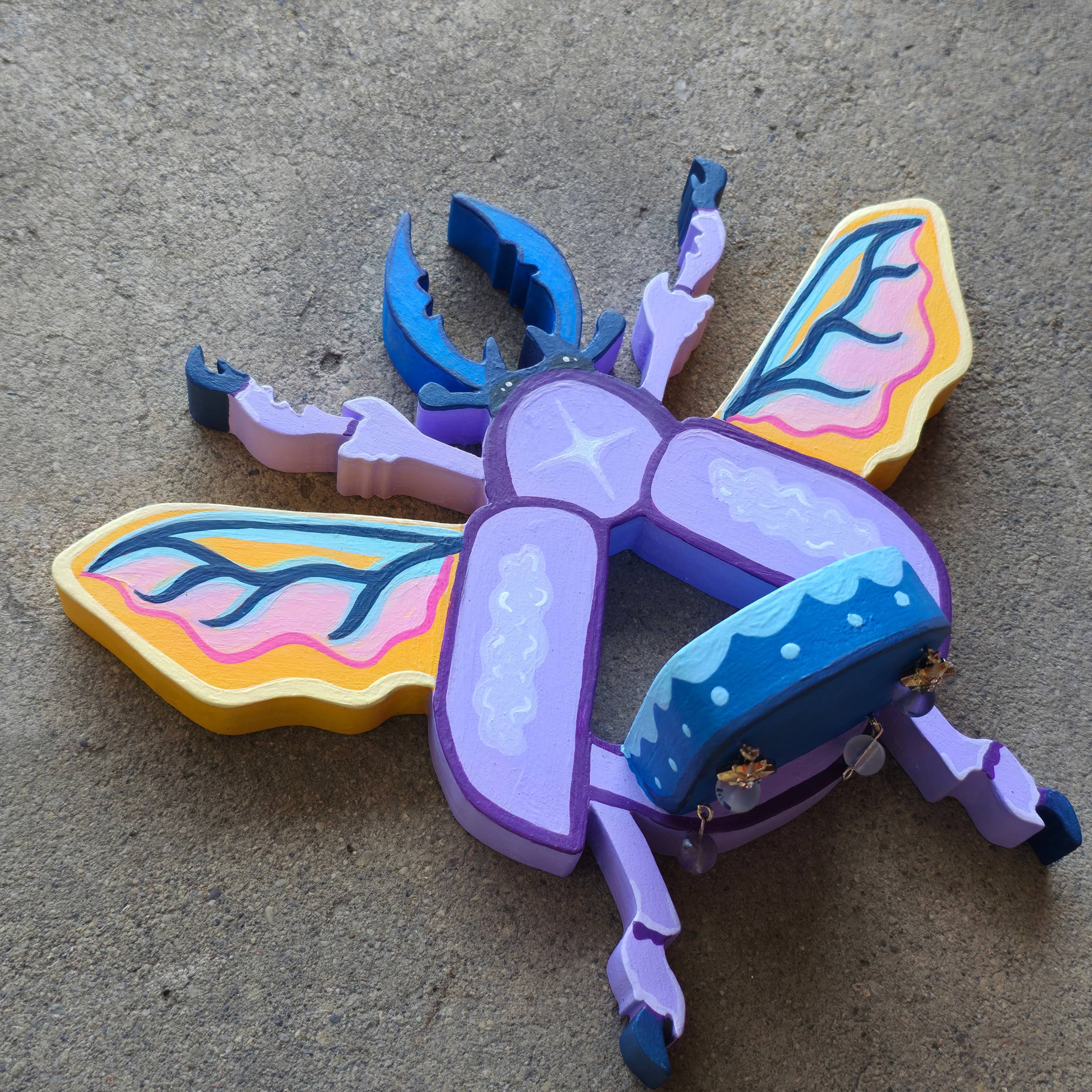 Beetle trinket shelf
