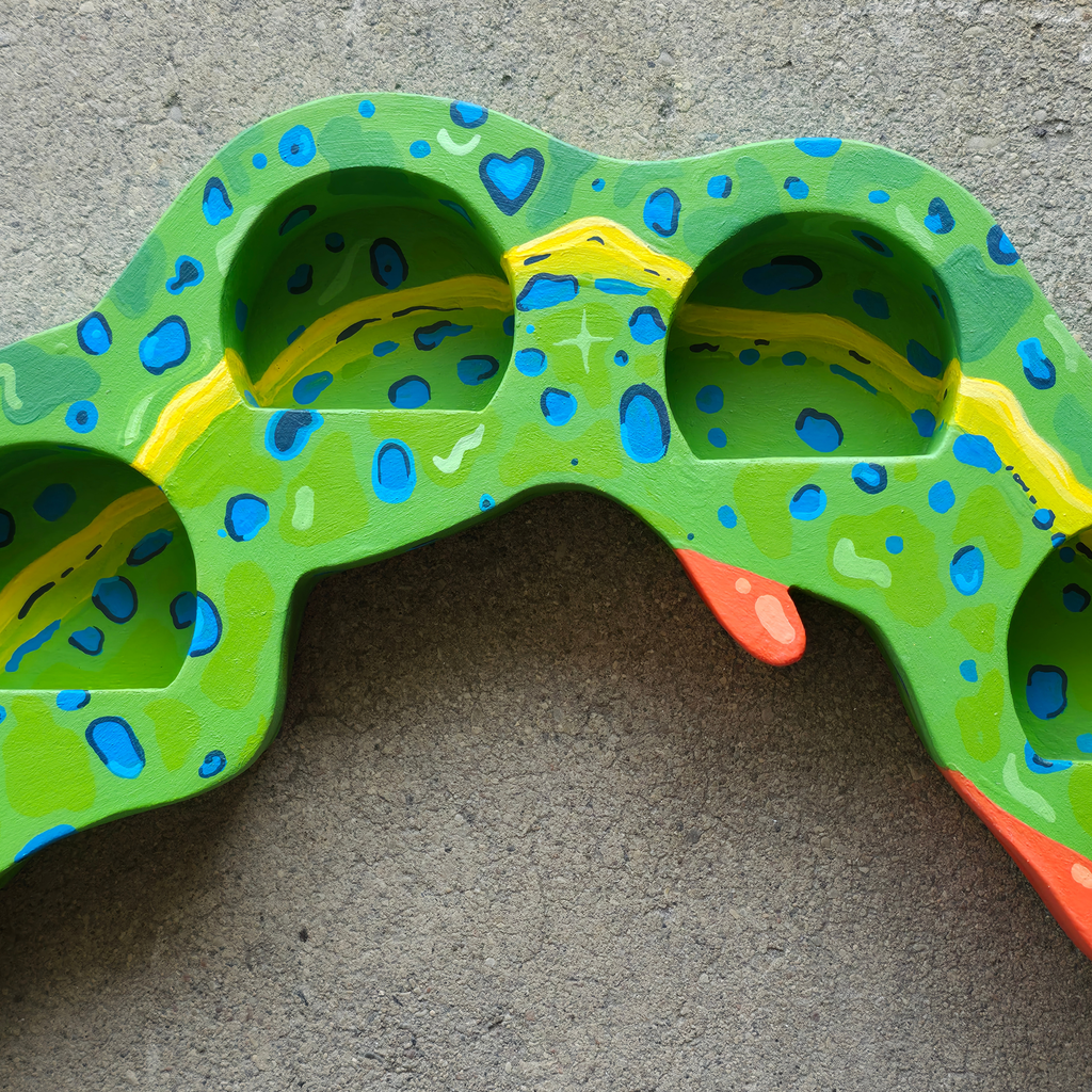 Caterpillar trinket shelf