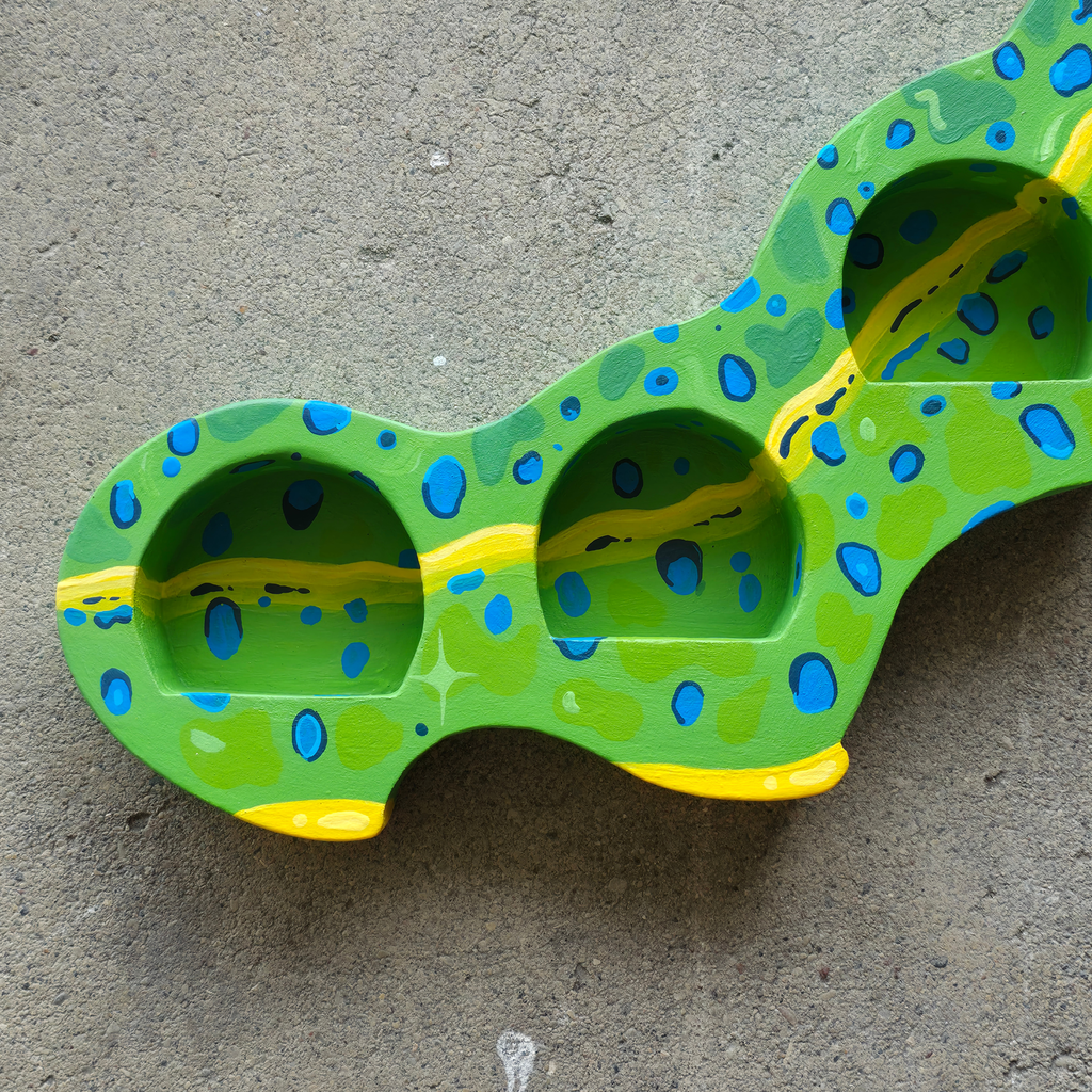 Caterpillar trinket shelf