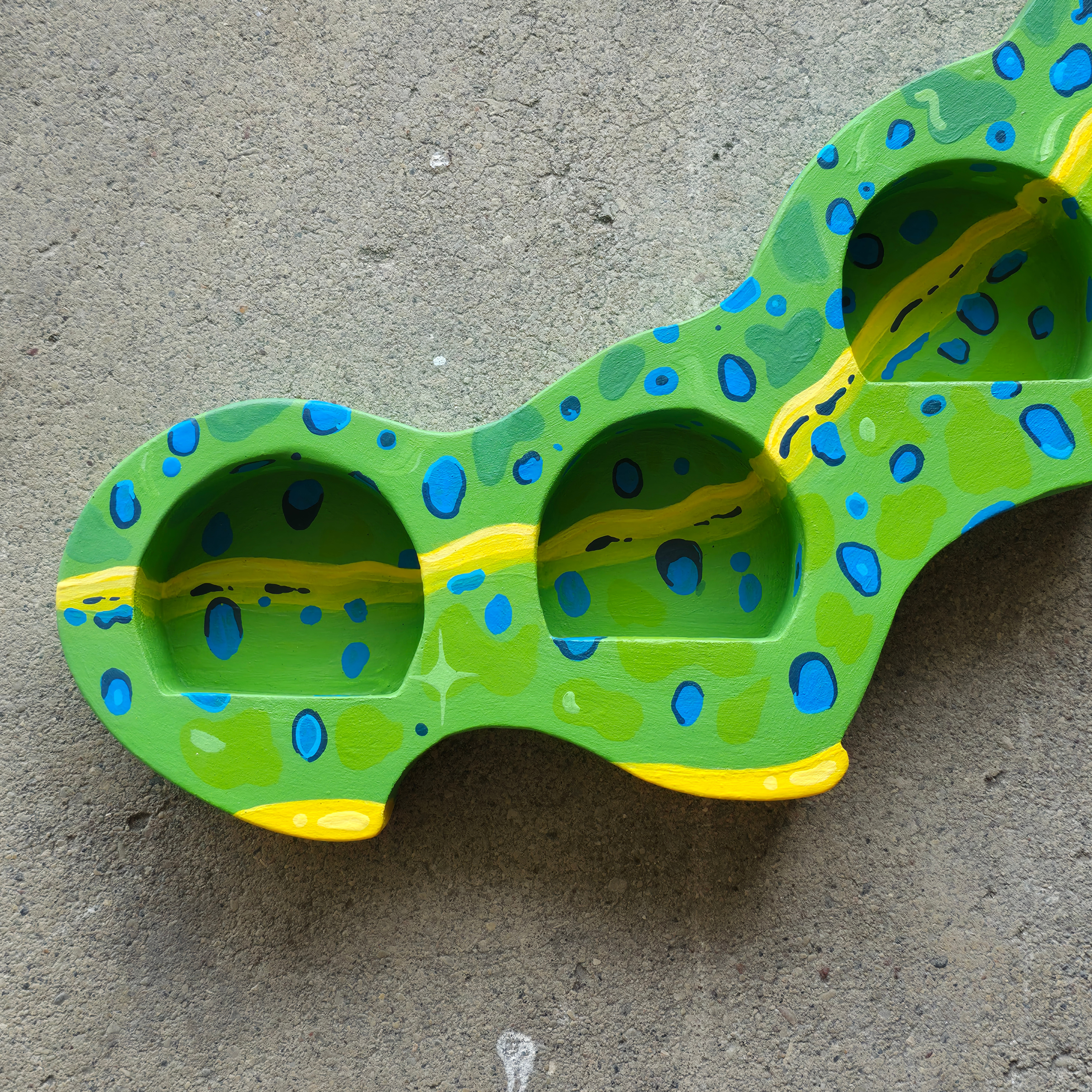 Caterpillar trinket shelf