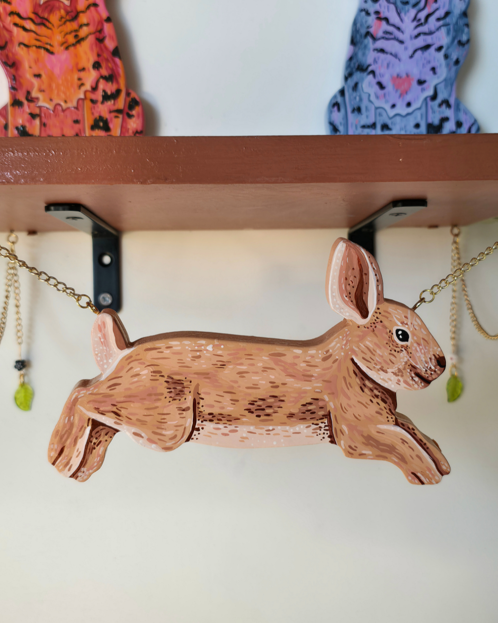 Bobcat and bunny shelf